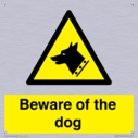 beware-of-the-dog-with-dog-warning-symbol~
